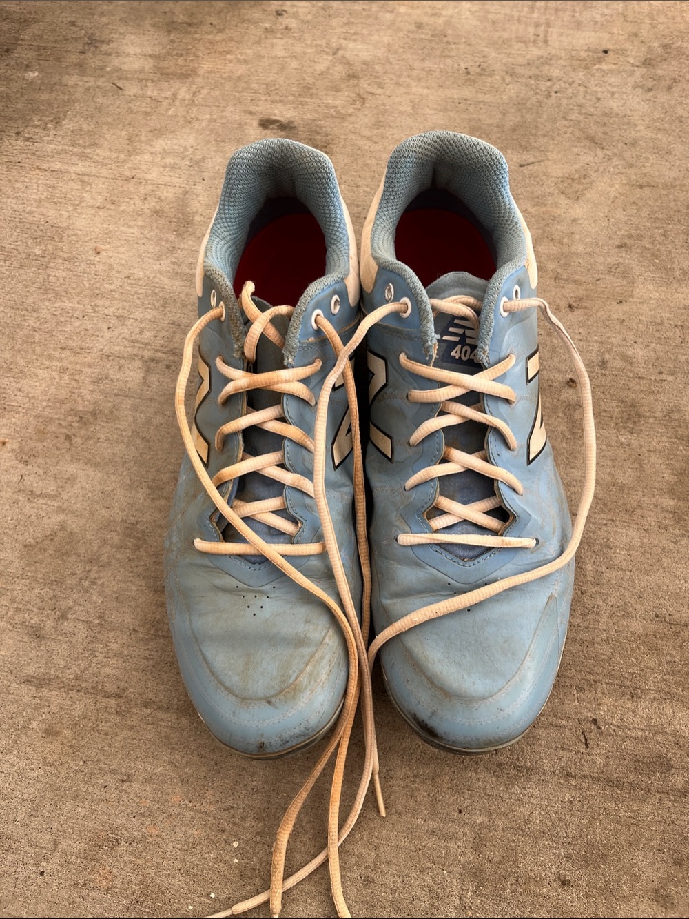 New Balance Light Blue baseball cleats